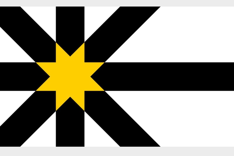 This flag has been around since 2018, it features a black nordic cross and a black Saltire, the golden star, where the crosses intersect, represents the sun rising. The white represents the former arms of the Sutherland County Council while the black represents the peat and dark skies of the Flow Country.