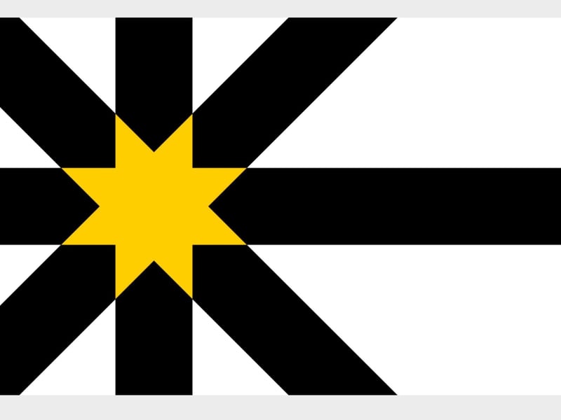 This flag has been around since 2018, it features a black nordic cross and a black Saltire, the golden star, where the crosses intersect, represents the sun rising. The white represents the former arms of the Sutherland County Council while the black represents the peat and dark skies of the Flow Country.