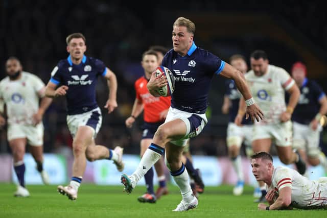 Duhan van der Merwe leaves England players in his wake as he scores his wonder try in Scotland's 29-23 win at Twickenham. (Photo by David Rogers/Getty Images)