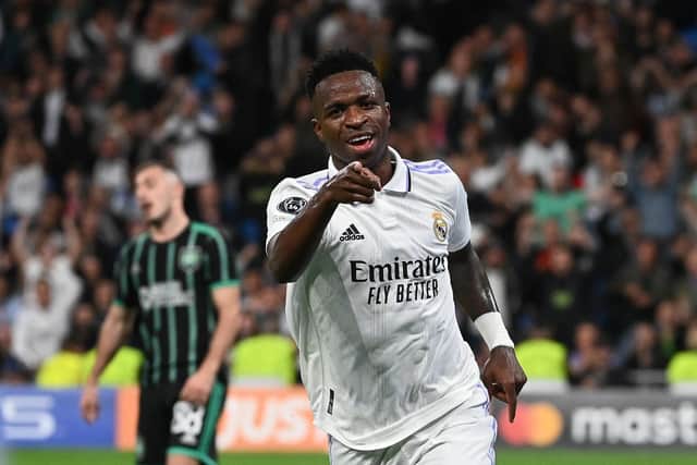 Vinicius Junior celebrates after scoring Real Madrid's foruth goal in the 5-1 win over Celtic at the Bernabeu. (Photo by PIERRE-PHILIPPE MARCOU/AFP via Getty Images)