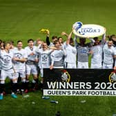 Queens Park celebrate winning the Scottish League Two title.