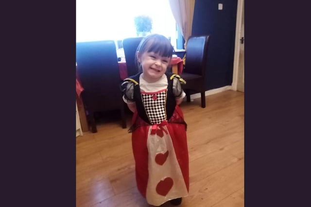 Alexis, age 4, spent her day as the Queen of Hearts from Alice in Wonderland.