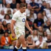 England's Owen Farrell is called over by referee Nika Amashukeli to be shown a yellow card, which was later upgraded to a red card by the TMO.