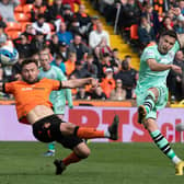 Hibs substitute Mykola Kukharevych fires home an equaliser - but Dundee United would go on to win 2-1.  (Photo by Ross Parker / SNS Group)