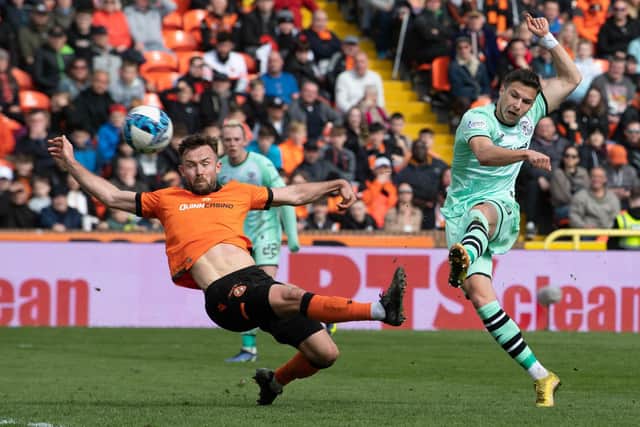 Hibs substitute Mykola Kukharevych fires home an equaliser - but Dundee United would go on to win 2-1.  (Photo by Ross Parker / SNS Group)