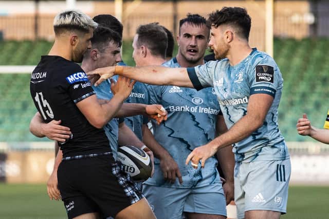 Glasgow Warriors' Adam Hastings exchanges words with Leinster's Hugo Keenan during the Rainbow Cup match at Scotstoun. Picture: Alan Harvey/SNS
