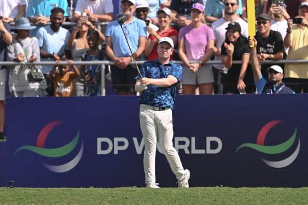 Bob MacIntyre tees off on the first hole during day three of the DP World Tour Championship on the Earth Course at Jumeirah Golf Estates in Dubai. Picture: Ross Kinnaird/Getty Images.