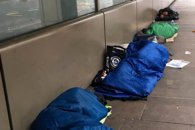 Homeless people sleeping rough, as more than 1,000 people have been housed through a government-funded programme to tackle homelessness.