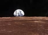 The Earth is so large that it distorts spacetime (Picture: Nasa/Newsmakers via Getty Images)