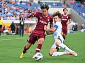 Yutaro Oda, left, plays for Vissel Kobe, with reports from Japan suggesting he is close to a move to Hearts.