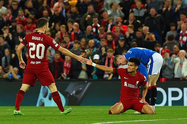 Diogo Jota of Liverpool with Luis Diaz of Liverpool  in action during the UEFA Champions League group A match between Liverpool FC and Rangers FC at Anfield on October 04, 2022 in Liverpool, England. (Photo by John Powell/Liverpool FC via Getty Images)