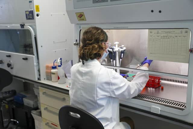 A scientist at work in an Oxford Vaccine Group's laboratory at the Churchill Hospital in Oxford (Picture: Steve Parsons/PA)