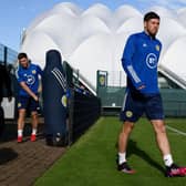 Scott McKenna strides purposefully onto the training pitch at Oriam in Edinburgh on Wednesday as Scotland prepare for their crucial World Cup qualifier against Israel at Hampden. (Photo by Craig Williamson / SNS Group)