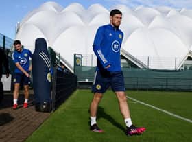 Scott McKenna strides purposefully onto the training pitch at Oriam in Edinburgh on Wednesday as Scotland prepare for their crucial World Cup qualifier against Israel at Hampden. (Photo by Craig Williamson / SNS Group)