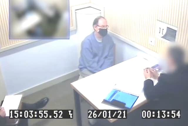 Undated handout grab from CCTV issued by Kent Police of David Fuller being questioned