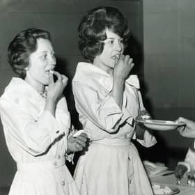Two usherettes from the Gaumont Cinema, Sheffield, were among the first people in the UK to take the polio pink "sugar lump" vaccine in May 1962 (Picture: Sheffield Newspapers)