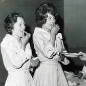 Two usherettes from the Gaumont Cinema, Sheffield, were among the first people in the UK to take the polio pink "sugar lump" vaccine in May 1962 (Picture: Sheffield Newspapers)