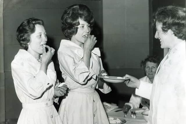 Two usherettes from the Gaumont Cinema, Sheffield, were among the first people in the UK to take the polio pink "sugar lump" vaccine in May 1962 (Picture: Sheffield Newspapers)