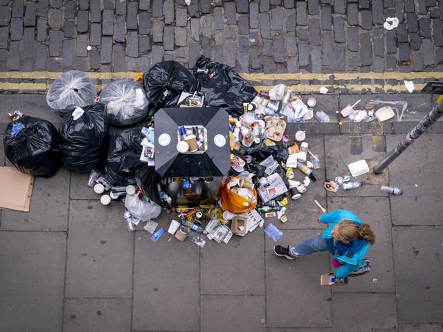 A picture from the fourth day of strike in Victoria Street in Edinburgh city centre as cleansing workers from the City of Edinburgh Council strike.