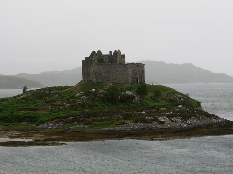 Castle Tioram has been dated back to the twelfth century by some and it was originally a principal stronghold of Clann Ruaidhrí and the traditional seat of 'Clan Raghnaill' which is a branch of Clan (Mac) Donald. Today it lies in ruin on a tidal island named Eilean Tioram in Loch Moidart in the Highlands.