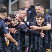 Dundee United's Dylan Levitt celebrates as he makes it 1-0 against Motherwell.