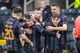 Dundee United's Dylan Levitt celebrates as he makes it 1-0 against Motherwell.