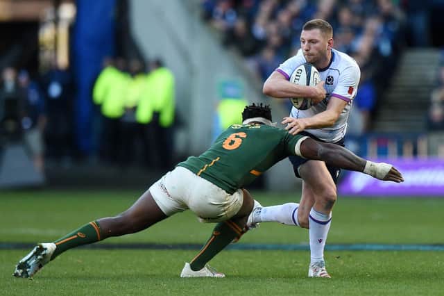 Finn Russell is tackled by Siya Kolisi during the last meeting between Scotland and South Africa, at Murrayfield in 2021. The sides will meet again at the World Cup in France on September 10. (Photo by David Gibson/Fotosport/Shutterstock)