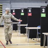 Members of the Royal Scots Dragoon Guard carry out a reconnaissance before setting up a Covid–19 vaccination centre at the Ravenscraig Regional Sports Facility in Motherwell, Lanarkhire, on Monday January 18.
