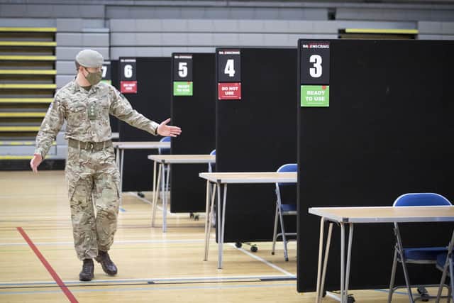 Members of the Royal Scots Dragoon Guard carry out a reconnaissance before setting up a Covid–19 vaccination centre at the Ravenscraig Regional Sports Facility in Motherwell, Lanarkhire, on Monday January 18.