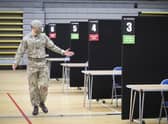 Members of the Royal Scots Dragoon Guard carry out a reconnaissance before setting up a Covid–19 vaccination centre at the Ravenscraig Regional Sports Facility in Motherwell, Lanarkhire, on Monday January 18.
