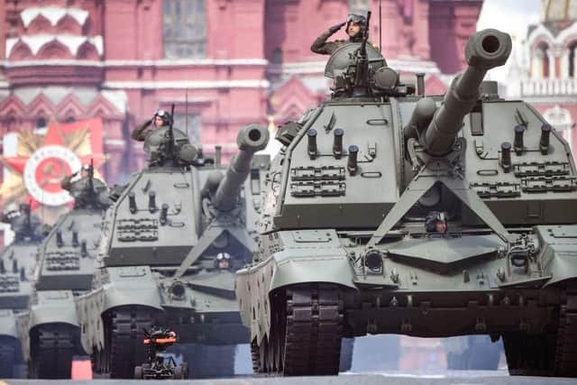 MSTA-S self-propelled howitzers parade through Red Square during the Victory Day military parade.