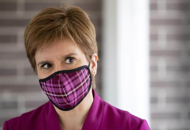 Nicola Sturgeon warns that Scotland is 'not out of the Covid woods yet' as daily Coronavirus figures are announced.