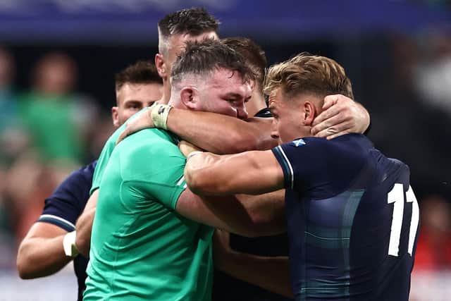 Scotland wing Duhan van der Merwe, right, was involved in a second-half scuffle as tempers frayed following Ollie Smith's attempted trip on Johnny Sexton. (Photo by ANNE-CHRISTINE POUJOULAT/AFP via Getty Images)
