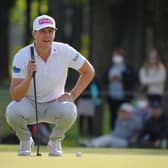 Calum Hill lines up a putt on the 18th green during the final round of the ISPS Handa Championship in Japan. Picture: Yoshimasa Nakano/Getty Images.