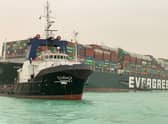 A giant container ship ran aground in the Suez Canal after a gust of wind blew it off course, the vessel's operator said on March 24, 2021, bringing marine traffic to a halt along one of the world's busiest trade routes.