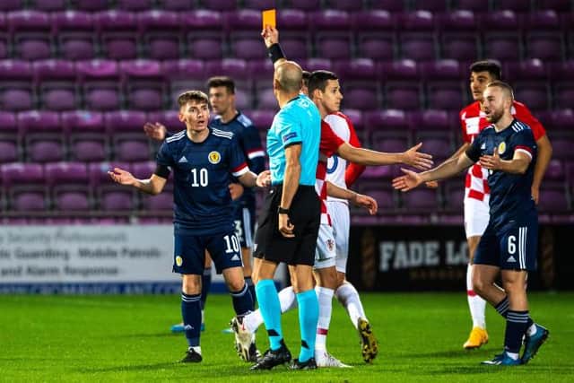 Allan Campbell pleads with the referee as Billy Gilmour is sent off (Photo by Craig Foy / SNS Group)