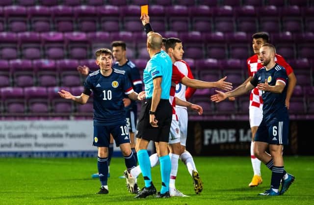 Allan Campbell pleads with the referee as Billy Gilmour is sent off (Photo by Craig Foy / SNS Group)