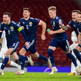 Scotland's players celebrate winning the penalty shoot-out against Israel in the play-off semi-final. Picture: SNS