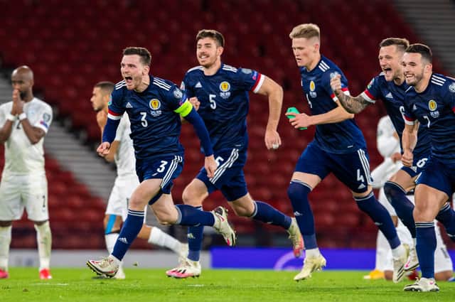 Scotland's players celebrate winning the penalty shoot-out against Israel in the play-off semi-final. Picture: SNS
