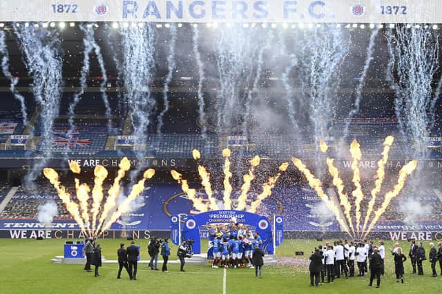 Rangers' James Tavernier lifts the Premiership trophy during the Scottish Premiership match  between Rangers and Aberdeen  at Ibrox Stadium, on May 15, 2021, in Glasgow, Scotland. Photo by Rob Casey / SNS