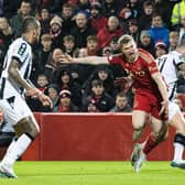 Aberdeen's Jack MacKenzie collides with PAOK's Adelino Vieirinha - but no penalty was given.
