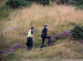 A man charged with murder offers no plea in court after death on Arthur's Seat