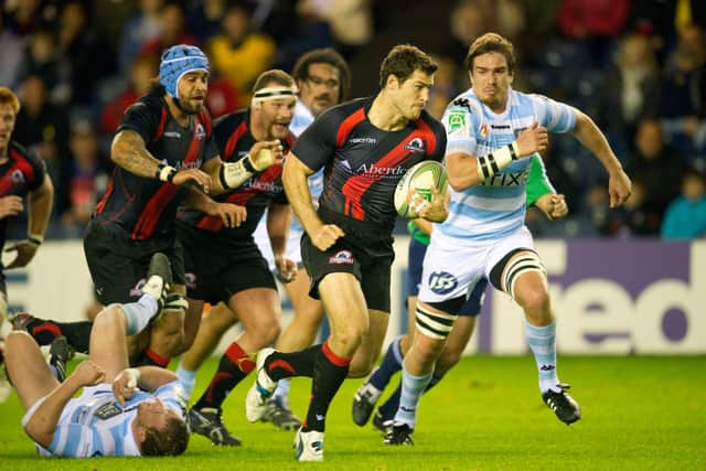 Tim Visser on the attack during Edinburgh's amazing 48-47 comeback win over Racing at Murrayfield ten years ago. Picture: Craig Watson/SNS