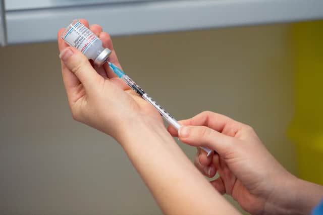 A nurse prepares the Moderna Covid-19 vaccine - it is the third vaccine to be approved for use in the UK picture: PA/Jacob King