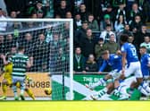 Alex Mitchell scores St Johnstone's equaliser in the 2-1 defeat to Celtic at McDiarmid Park. (Photo by Ross MacDonald / SNS Group)