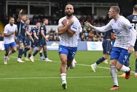 Rangers striker Kemar Roofe celebrates scoring the opener in the 2-0 win at Ross County. (Photo by Rob Casey / SNS Group)