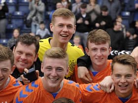 Nicky Hogarth among the Rangers squad celebrating the reserve league title in 2019.  (Picture: Michael Gillen)