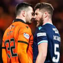 Dundee United striker Tony Watt and Dundee defender Ryan Sweeney square up during the derby clash at Dens Park.  (Photo by Roddy Scott / SNS Group)