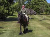 Queen Elizabeth rides a pony in Windsor Home Park in May 2020 (Picture: Steve Parsons/WPA pool/Getty Images)