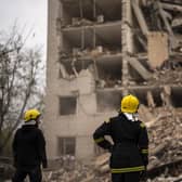 Firefighters work on a building partially destroyed after a Russian bombardment in Chernihiv, Ukraine. Picture: AP Photo/Francisco Seco